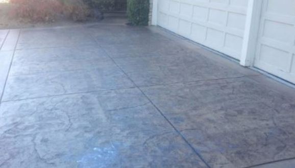 a picture of a new stamped concrete driveway construction in roseville, ca