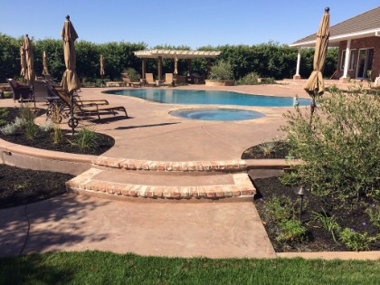 picture of a concrete pool deck, walkway, and stairs in Roseville, California